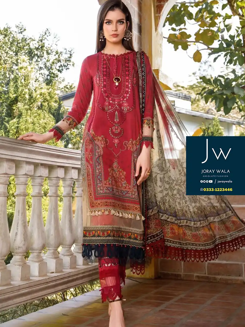 Elegant women wearing Maria b Red color suits from the party fancy lawn collection 2024, sophistication and style.