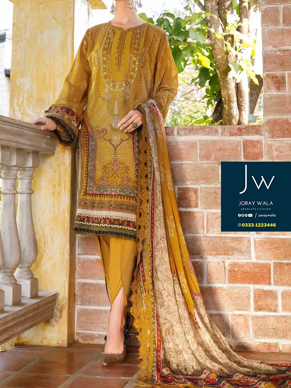 Elegant women wearing Maria b yellow color suits from the party fancy lawn collection 2024, sophistication and style.