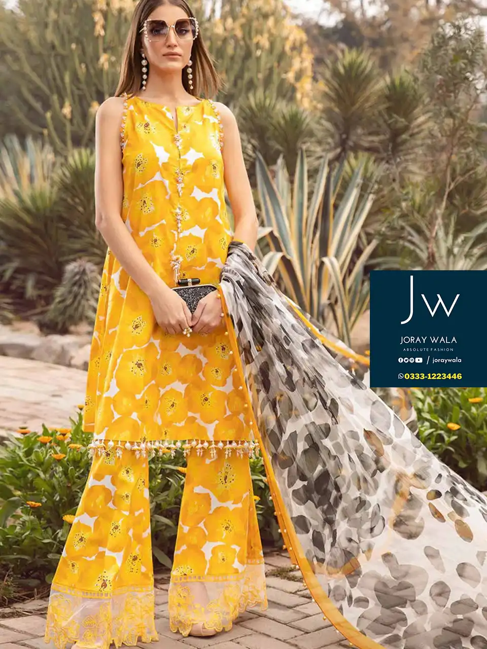 Model wearing Yellow color 3 pcs suit, with gray pattern dupatta, master copy, Maria B MPT-2112-B suit, available at joraywala