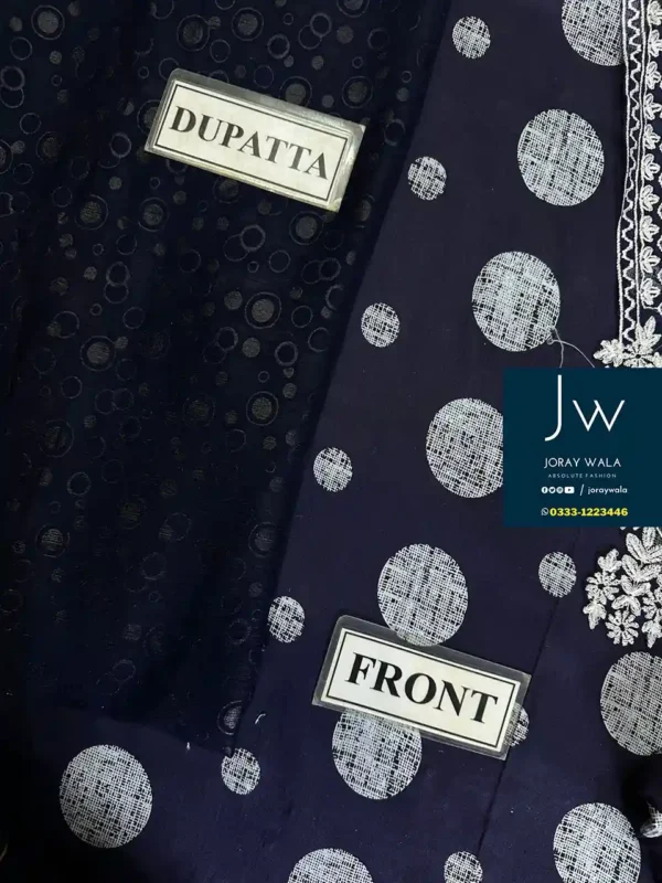 Open suit picture of blue color polka dots 3pcs embroidered suit and the suit is available at joraywala