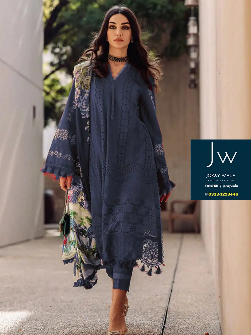 Model wearing blue color saira rizwan beautiful suit, available at joraywala with free delivery