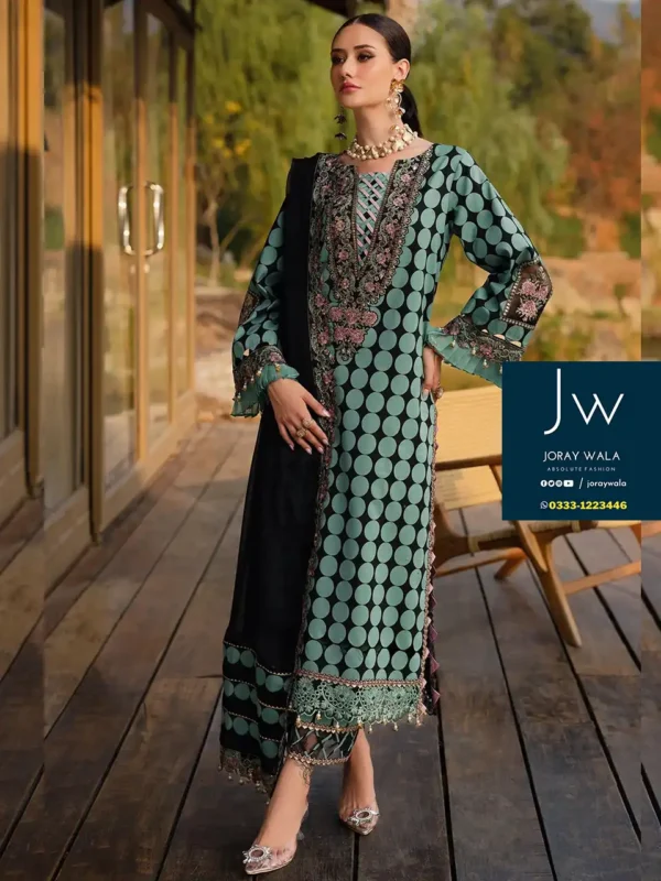 Beautiful girl wearing a dots pattern 3 pcs suit., suits represent Pakistani culture.